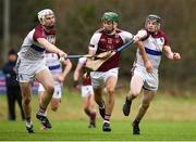 24 January 2019; Brian Concannon of N.U.I. Galway in action against Conor Cleary, left, and Kevin O'Brien of University of Limerick during the Electric Ireland Fitzgibbon Cup Group A Round 2 match between N.U.I. Galway and University of Limerick at the National University of Ireland in Galway. Photo by Harry Murphy/Sportsfile