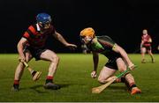 24 January 2019; Conor Langton of IT Carlow in action against Christopher Lynch of Trinity during the Electric Ireland Fitzgibbon Cup Group B Round 2 match between Trinity and IT Carlow at the Trinity College Sports Grounds in Santry Demesne, Dublin. Photo by Stephen McCarthy/Sportsfile