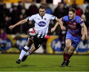 25 January 2019; Georgie Kelly of Dundalk in action against Kevin Farragher of Drogheda United during the Jim Malone Cup match between Dundalk and Drogheda United at Oriel Park in Dundalk, Co. Louth. Photo by Seb Daly/Sportsfile