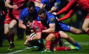 25 January 2019; Dan Jones of Scarlets is pushed into touch by Conor O'Brien, left, and Rory O'Loughlin of Leinster during the Guinness PRO14 Round 14 match between Leinster and Scarlets at the RDS Arena in Dublin. Photo by Ramsey Cardy/Sportsfile