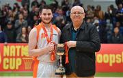 25 January 2019; Glasnevin captain Mark Flynn is presented with the cup by Ken Clarke, member of the NABC, after the Hula Hoops NICC Men’s Cup Final match between Glasnevin and Drogheda Bullets at the National Basketball Arena in Tallaght, Dublin. Photo by Brendan Moran/Sportsfile