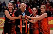 26 January 2019; Killester joint captains, from left, Catriona White, Ciara Fenton and Siobhan Kennedy are presented with the cup by Ken Clarke, member of the NABC, after the Hula Hoops NICC Women’s National Cup Final match between Fr Mathews and Killester at the National Basketball Arena in Tallaght, Dublin. Photo by Brendan Moran/Sportsfile