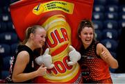 26 January 2019; Hannah Feerick, left, and Ali Cleary of Killester with the Hula Hoops mascot after the Hula Hoops NICC Women’s National Cup Final match between Fr Mathews and Killester at the National Basketball Arena in Tallaght, Dublin. Photo by Eóin Noonan/Sportsfile
