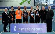 26 January 2019; The Clonliffe Harrier's team and officials, with Athletics Ireland President Georgina Drumm, left, and the shield after winning the men's competition during the AAI National Indoor League Round 2 at the AIT International Arena in Athlone, Co. Westmeath. Photo by Sam Barnes/Sportsfile