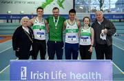 26 January 2019; The Raheny Shamrocks team, Co. Dublin, with Athletics Ireland President Georgina Drumm, left, and their bronze medals after finishing third in the men's competition during the AAI National Indoor League Round 2 at the AIT International Arena in Athlone, Co. Westmeath. Photo by Sam Barnes/Sportsfile