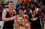 26 January 2019; Tradehouse Central Ballincollig captain Ciaran O'Sullivan, left, and team-mate Andre Nation are presented with the cup by President of Basketball Ireland Theresa Walsh after the Hula Hoops Men’s President's National Cup Final match between Bad Bobs Tolka Rovers and Tradehouse Central Ballincollig at the National Basketball Arena in Tallaght, Dublin. Photo by Brendan Moran/Sportsfile