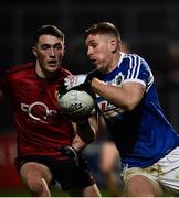 26 January 2019; Evan O'Carroll of Laois in action against Conor Francis of Down during the Allianz Football League Division 3 Round 1 match between Down and Laois at Páirc Esler in Newry, Co. Down. Photo by Oliver McVeigh/Sportsfile