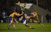 26 January 2019; Ronan Maher of Tipperary in action against Michael O'Neill and John Conlon of Clare during the Allianz Hurling League Division 1A Round 1 match between Tipperary and Clare at Semple Stadium in Thurles, Co. Tipperary. Photo by Diarmuid Greene/Sportsfile