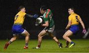 26 January 2019; Diarmuid O'Connor of Mayo in action against Ronan Daly, left, and Conor Hussey of Roscommon during the Allianz Football League Division 1 Round 1 match between Mayo and Roscommon at Elverys MacHale Park in Castlebar, Co. Mayo. Photo by Piaras Ó Mídheach/Sportsfile