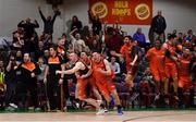 26 January 2019; Pyrobel Killester players, including Paddy Sullivan and Andy McGeever, and supporters celebrate after the Hula Hoops Men’s Pat Duffy National Cup Final match between Pyrobel Killester and UCD Marian at the National Basketball Arena in Tallaght, Dublin. Photo by Brendan Moran/Sportsfile