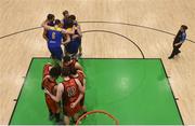 26 January 2019; Both team's huddle near the end of the game during the Hula Hoops Men’s Pat Duffy National Cup Final match between Pyrobel Killester and UCD Marian at the National Basketball Arena in Tallaght, Dublin. Photo by Eóin Noonan/Sportsfile