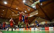 26 January 2019; Cathal Finn of UCD Marian is blocked by Luis Filiberto Garcia Hoyos and Kieran O’Brien of Pyrobel Killester during the Hula Hoops Men’s Pat Duffy National Cup Final match between Pyrobel Killester and UCD Marian at the National Basketball Arena in Tallaght, Dublin. Photo by Brendan Moran/Sportsfile