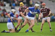 27 January 2019; Ryan Mullaney of Laois in action against Sean Bleahene, left, and Thomas Monaghan of Galway during the Allianz Hurling League Division 1B Round 1 match between Galway and Laois at Pearse Stadium in Galway. Photo by Ray Ryan/Sportsfile