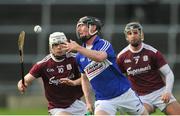 27 January 2019; John Lennon of Laois in action against Jack Coyne, left, and Aidan Harte of Galway during the Allianz Hurling League Division 1B Round 1 match between Galway and Laois at Pearse Stadium in Galway. Photo by Ray Ryan/Sportsfile