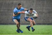 27 January 2019; Dermot Malone of Monaghan is tackled by Paul Mannion of Dublin during the Allianz Football League Division 1 Round 1 match between Monaghan and Dublin at St Tiernach's Park in Clones, Co. Monaghan. Photo by Ramsey Cardy/Sportsfile