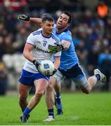 27 January 2019; Dermot Malone of Monaghan is tackled by Michael Darragh Macauley of Dublin during the Allianz Football League Division 1 Round 1 match between Monaghan and Dublin at St Tiernach's Park in Clones, Co. Monaghan. Photo by Ramsey Cardy/Sportsfile