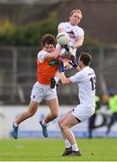 27 January 2019; Keith Cribbin of Kildare in action against Jarlath Óg Burns of Armagh, as Fionn Dowling of Kildare looks on, during the Allianz Football League Division 2 Round 1 match between Kildare and Armagh at St Conleth's Park in Newbridge, Kildare. Photo by Piaras Ó Mídheach/Sportsfile