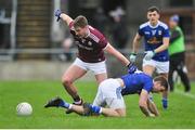 27 January 2019; Gary O'Donnell of Galway in action against Killian Clarke of Cavan during the Allianz Football League Division 1 Round 1 match between Galway and Cavan at Pearse Stadium in Galway. Photo by Ray Ryan/Sportsfile