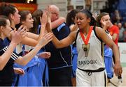 27 January 2019; Kollyns Scarbrough of Ulster University Elks with the Maree team after the Hula Hoops Women’s Division One National Cup Final match between Maree and Ulster University Elks at the National Basketball Arena in Tallaght, Dublin. Photo by Brendan Moran/Sportsfile