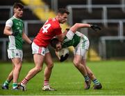 27 January 2019; Ryan Jones of Fermanagh in action against John O'Rourke of Cork during the Allianz Football League Division 2 Round 1 match between Fermanagh and Cork at Brewster Park in Enniskillen, Fermanagh. Photo by Oliver McVeigh/Sportsfile