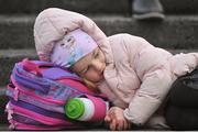 27 January 2019; Kayleigh O'Shaughnessy, age 5, from Corrandulla, has a rest during the Allianz Football League Division 1 Round 1 match between Galway and Cavan at Pearse Stadium in Galway. Photo by Ray Ryan/Sportsfile