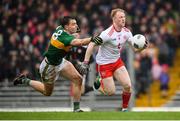 27 January 2019; Hugh Pat McGeary of Tyrone in action against Jack Barry of Kerry during the Allianz Football League Division 1 Round 1 match between Kerry and Tyrone at Fitzgerald Stadium in Killarney, Kerry. Photo by Stephen McCarthy/Sportsfile