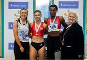 27 January 2019; Junior Women 60m medallists, from left, Lauren Cadden of Sligo AC, Co. Sligo, bronze, Lauren Roy of City of Lisburn A.C., Co. Down, gold, and Patience Jumbo-Gula of Dundalk St. Gerards AC, Co. Louth, silver, with Athletics Ireland President Georgina Drumm during the Irish Life Health Junior and U23 Indoors at AIT International Arena in Athlone, Co. Westmeath. Photo by Sam Barnes/Sportsfile