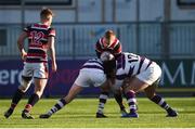 30 January 2019; Henry O'Hagan of Wesley College is tackled by Ryan McMahon, left, and Joe Carroll of Clongowes Wood College during the Bank of Ireland Leinster Schools Senior Cup Round 1 match between Wesley College and Clongowes Wood College at Energia Park in Dublin. Photo by Ben McShane/Sportsfile