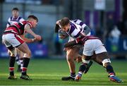 30 January 2019; Calum Doyle of Clongowes Wood College is tackled by Alfred Oropo of Wesley College during the Bank of Ireland Leinster Schools Senior Cup Round 1 match between Wesley College and Clongowes Wood College at Energia Park in Dublin. Photo by Eóin Noonan/Sportsfile