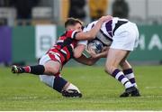 30 January 2019; Joe Carroll of Clongowes Wood College is tackled by Timothy Elliot of Wesley College during the Bank of Ireland Leinster Schools Senior Cup Round 1 match between Wesley College and Clongowes Wood College at Energia Park in Dublin. Photo by Ben McShane/Sportsfile