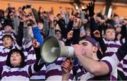 30 January 2019; Clongowes Wood College supporter Eddie Boland leads his school mates in celebration after the Bank of Ireland Leinster Schools Senior Cup Round 1 match between Wesley College and Clongowes Wood College at Energia Park in Dublin. Photo by Eóin Noonan/Sportsfile