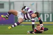 30 January 2019; Hugo Philips of Clongowes Wood College is tackled by Adam Campion of Wesley College during the Bank of Ireland Leinster Schools Senior Cup Round 1 match between Wesley College and Clongowes Wood College at Energia Park in Dublin. Photo by Eóin Noonan/Sportsfile