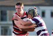 30 January 2019; Chris Gilmer of Wesley College is tackled by Hugh Lonergan of Clongowes Wood College during the Bank of Ireland Leinster Schools Senior Cup Round 1 match between Wesley College and Clongowes Wood College at Energia Park in Dublin. Photo by Ben McShane/Sportsfile
