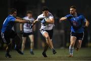 30 January 2019; Luke Fortune of University College Dublin in action against James McCusker, left, and James McCusker of TU Dublin City Campus during the Electric Ireland Sigerson Cup Round 3 match between UCD and TUDCC at Billings Park in UCD, Dublin. Photo by Eóin Noonan/Sportsfile