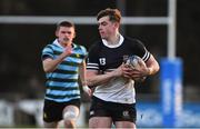 30 January 2019; Marcud Kiely of Newbridge College gets away from Marc Finn of St Gerard's School during the Bank of Ireland Leinster Schools Senior Cup Round 1 match between Newbridge College and St Gerard’s School at Templeville Road in Dublin. Photo by Piaras Ó Mídheach/Sportsfile