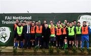 31 January 2019; President Michael D Higgins poses for a photograph with FAI staff, who were participating in a lunch time game of football, during a visit to the FAI Headquarters in Abbottstown, Dublin. Photo by Stephen McCarthy/Sportsfile