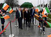 31 January 2019; President Michael D Higgins accompanied by FAI President Donal Conway, left, and FAI Director of Competitions Fran Gavin, right, arrives for a visit to the FAI Headquarters in Abbottstown, Dublin. Photo by Stephen McCarthy/Sportsfile