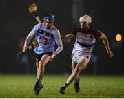 31 January 2019; Rory Percell of UCD in action against Michael Carey of UL during the Electric Ireland Fitzgibbon Cup Group A Round 3 match between University College Dublin and University of Limerick at Billings Park in Belfield, Dublin. Photo by Stephen McCarthy/Sportsfile