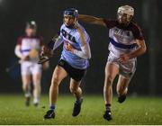 31 January 2019; Rory Percell of UCD in action against Michael Carey of UL during the Electric Ireland Fitzgibbon Cup Group A Round 3 match between University College Dublin and University of Limerick at Billings Park in Belfield, Dublin. Photo by Stephen McCarthy/Sportsfile