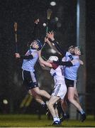 31 January 2019; Paul Crummey, left, and Stephen Quirke of UCD in action against Jordan Henley and Aidan McGuane of UL during the Electric Ireland Fitzgibbon Cup Group A Round 3 match between University College Dublin and University of Limerick at Billings Park in Belfield, Dublin. Photo by Stephen McCarthy/Sportsfile