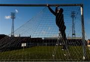 2 February 2019; Bohemians groundsman Noel Cosgrove hangs the goal net prior to the IRN-BRU Scottish Challenge Cup Quarter-Final match between Bohemians and East Fife at Dalymount Park in Dublin. Photo by Harry Murphy/Sportsfile