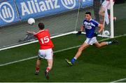 2 February 2019; Ryan Burns of Louth palms the ball to the net for his side's second goal, as Robbie Piggott of Laois, looks on during the Allianz Football League Division 3 Round 2 match between Laois and Louth at Croke Park in Dublin. Photo by Piaras Ó Mídheach/Sportsfile