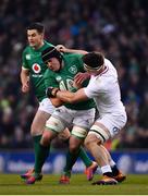 2 February 2019; CJ Stander of Ireland is tackled by Tom Curry of England during the Guinness Six Nations Rugby Championship match between Ireland and England in the Aviva Stadium in Dublin. Photo by Ramsey Cardy/Sportsfile