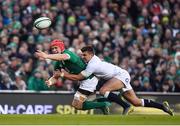 2 February 2019; Josh van der Flier of Ireland loses possession as he is tackled by Henry Slade of England during the Guinness Six Nations Rugby Championship match between Ireland and England in the Aviva Stadium in Dublin. Photo by Brendan Moran/Sportsfile