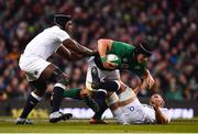 2 February 2019; CJ Stander of Ireland is tackled by Maro Itoje, left, George Kruis of England during the Guinness Six Nations Rugby Championship match between Ireland and England in the Aviva Stadium in Dublin. Photo by Ramsey Cardy/Sportsfile