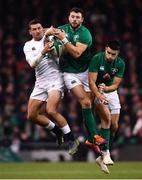 2 February 2019; Jonny May of England is tackled by Robbie Henshaw, left, and Conor Murray of Ireland during the Guinness Six Nations Rugby Championship match between Ireland and England in the Aviva Stadium in Dublin. Photo by Ramsey Cardy/Sportsfile