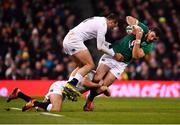 2 February 2019; Robbie Henshaw of Ireland is tackled by Ben Youngs and Jonny May of England during the Guinness Six Nations Rugby Championship match between Ireland and England in the Aviva Stadium in Dublin. Photo by Ramsey Cardy/Sportsfile