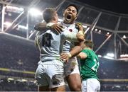 2 February 2019; Henry Slade of England celebrates after scoring his side's third try with teammate Manu Tuilagi during the Guinness Six Nations Rugby Championship match between Ireland and England in the Aviva Stadium in Dublin. Photo by Brendan Moran/Sportsfile