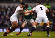 2 February 2019; Jonathan Sexton of Ireland is tackled by Manu Tuilagi, left, and Jamie George of England during the Guinness Six Nations Rugby Championship match between Ireland and England in the Aviva Stadium in Dublin. Photo by Ramsey Cardy/Sportsfile