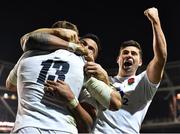 2 February 2019; Henry Slade of England celebrates after scoring his side's third try with teammate Manu Tuilagi and Ben Youngs, right, during the Guinness Six Nations Rugby Championship match between Ireland and England in the Aviva Stadium in Dublin. Photo by Brendan Moran/Sportsfile